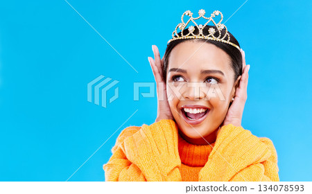 Mockup, crown or happy with woman in studio for celebration, princess and party. Smile, beauty and fashion with female tiara on blue background and excited for achievement, winner and wow prom event Mockup, crown or happy with woman in studio for celebration, princess and party. Smile, beauty and fashion with female tiara on blue background and excited for achievement, winner and wow prom event 134078593