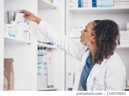 Woman, drugs and pharmacist in pharmacy with supplements, healthcare and medicine in drug store. Vitamins, pills and female search for prescription medication with stock and pharmaceutical industry Woman, drugs and pharmacist in pharmacy with supplements, healthcare and medicine in drug store. Vitamins, pills and female search for prescription medication with stock and pharmaceutical industry 134078691