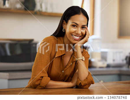 Smile, happy and portrait of woman in kitchen in home for relaxing, happiness and resting on counter. House, joy and face of Hispanic female with confidence, ready for cooking and calm on weekend 134078748