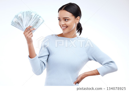 Hand, happy and woman with money in studio for investment, savings and growth on white background. Winner, smile and cash for young female excited about financial freedom, lottery or winning prize 134078925