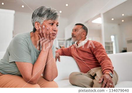 Divorce, stress and senior couple in home living room on sofa with conflict, infidelity or cheating. Retirement, elderly and man and woman fighting, sad or depressed with marriage problem or thinking Divorce, stress and senior couple in home living room on sofa with conflict, infidelity or cheating. Retirement, elderly and man and woman fighting, sad or depressed with marriage problem or thinking 134079040