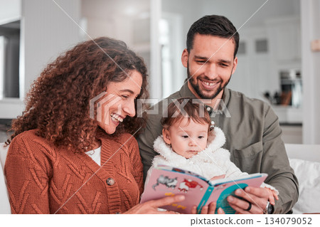 Parents, baby and reading story on sofa with smile, happiness and bonding with love in living room. Man, woman and child with book for learning, care and relax together on lounge couch in family home 134079052