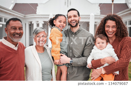 Family, generations and happy people in portrait outdoor, grandparents and parents with children on lawn at home. Men, women and kids, love and care in relationship with smile and happiness at house 134079087