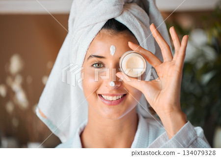 Happy woman, face and skincare cream for beauty, cosmetics or facial treatment with smile at spa. Portrait of beautiful female smiling with creme or lotion for anti aging or dermatology at salon 134079328