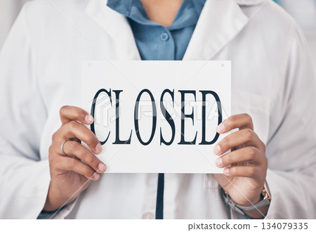Hands closeup, closed sign and small business for store, pharmacy or shop in recession, bankrupt and retail. Woman pharmacist, poster or board for announcement for medical shopping for healthcare Hands closeup, closed sign and small business for store, pharmacy or shop in recession, bankrupt and retail. Woman pharmacist, poster or board for announcement for medical shopping for healthcare 134079335