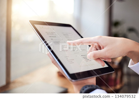 Closeup person, menu and tablet in cafe for ordering food, meal and lunch on technology. Restaurant customer, hands and screen of digital options, app choice and selection list online in coffee shop Closeup person, menu and tablet in cafe for ordering food, meal and lunch on technology. Restaurant customer, hands and screen of digital options, app choice and selection list online in coffee shop 134079532