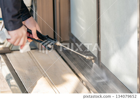 High-pressure washing of window sashes High-pressure washing of window sashes 134079652