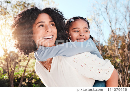 Family, mother and piggyback child in outdoor love, care and playing games for fun in backyard. Smile of woman carrying girl kid in nature to relax together in summer with a hug for support or trust Family, mother and piggyback child in outdoor love, care and playing games for fun in backyard. Smile of woman carrying girl kid in nature to relax together in summer with a hug for support or trust 134079656
