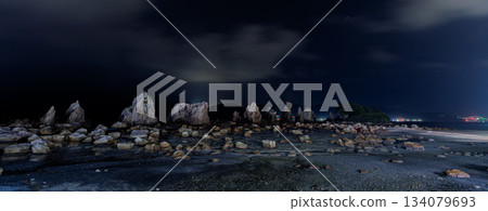 Bridge pile rock at night Bridge pile rock at night 134079693