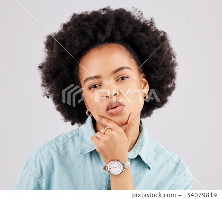 Fashion, beauty and portrait of a black woman in a studio with accessories, pout and positive mindset. Stylish, trendy and headshot of serious African female model posing isolated by gray background. Fashion, beauty and portrait of a black woman in a studio with accessories, pout and positive mindset. Stylish, trendy and headshot of serious African female model posing isolated by gray background. 134079819