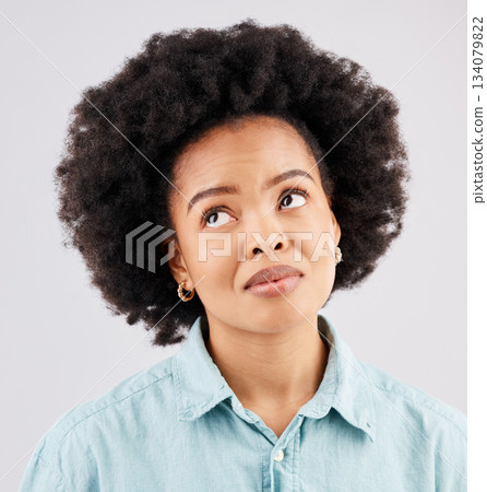 Thinking, space and face of black woman in studio for mockup, idea and promotion. Show, information and mockup with female isolated on white background for logo, announcement and advertising Thinking, space and face of black woman in studio for mockup, idea and promotion. Show, information and mockup with female isolated on white background for logo, announcement and advertising 134079822