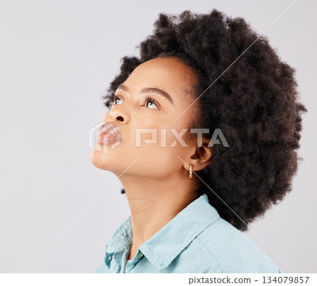 Black woman, afro and thinking in studio with vision, ideas or looking up by white background. Girl, young model and student with idea, brainstorming or mindset for focus, fashion or calm by backdrop 134079857