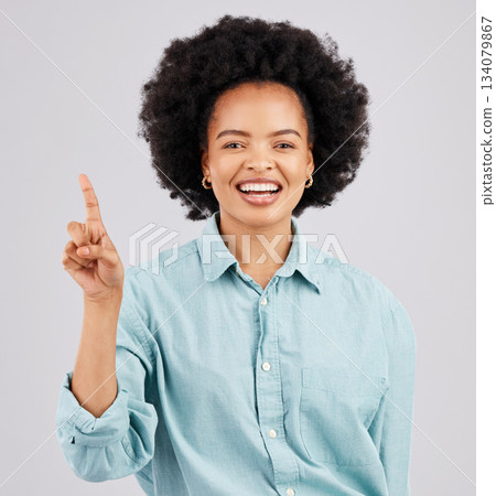Woman portrait, thinking and idea with a smile in a studio with a solution to a question with happiness. Isolated, gray background and female feeling happy and confident from inspiration and ideas Woman portrait, thinking and idea with a smile in a studio with a solution to a question with happiness. Isolated, gray background and female feeling happy and confident from inspiration and ideas 134079867