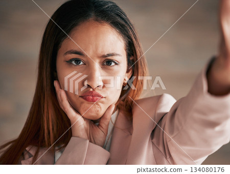 Selfie, sad and portrait of woman with comic, emoji reaction and pout facial expression on studio background. Beauty, confused and girl taking picture with cute, upset and funny face for social media Selfie, sad and portrait of woman with comic, emoji reaction and pout facial expression on studio background. Beauty, confused and girl taking picture with cute, upset and funny face for social media 134080176