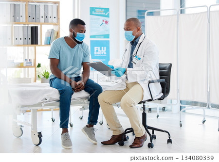 Doctor, consultation and covid results on clipboard with black man for checkup, test or examination. Healthcare, medical professional and checklist for advice, diagnosis or information in clinic. Doctor, consultation and covid results on clipboard with black man for checkup, test or examination. Healthcare, medical professional and checklist for advice, diagnosis or information in clinic. 134080339