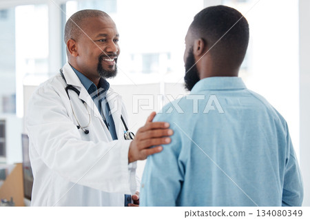 Doctor, black man and touch shoulder of patient for support, comfort and empathy in hospital. Healthcare, consultation and happy medical professional talking, good news or kindness with mature person Doctor, black man and touch shoulder of patient for support, comfort and empathy in hospital. Healthcare, consultation and happy medical professional talking, good news or kindness with mature person 134080349