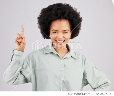 Woman portrait, up direction and idea hand sign with a smile in a studio with a solution to a question. Isolated, white background and female feeling happy and confident from inspiration and ideas Woman portrait, up direction and idea hand sign with a smile in a studio with a solution to a question. Isolated, white background and female feeling happy and confident from inspiration and ideas 134080507