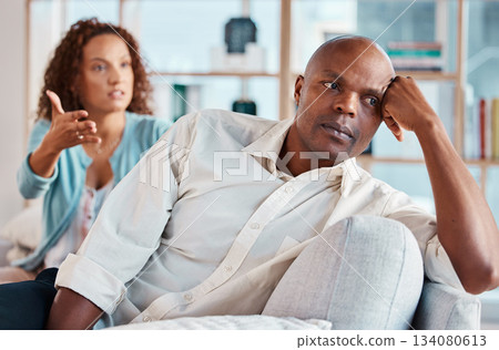 Couple, fight and ignore on sofa for problems, breakup and bad communication in lounge. Divorce, crisis and frustrated people in conflict, angry partner and betrayal of cheating, drama and depression 134080613