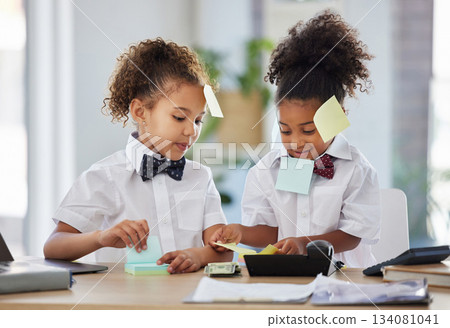 Children, together and playing office with sticky note at desk with happiness, brainstorming and teamwork. Kids, girl and group with paper, planning and play as business people for bond with games 134081041