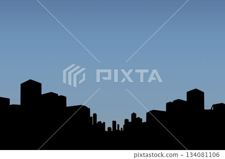 Silhouette cityscape against clear blue sky 134081106