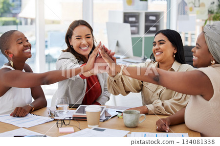 Teamwork, business women and high five in office for team building, motivation and collaboration. Cooperation, celebration and group of happy people or staff celebrating goals, success or achievement 134081338