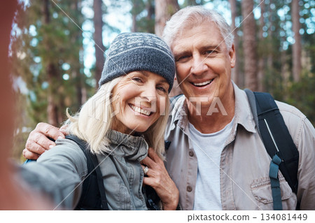 Old couple, selfie and hiking in forest, happy people in portrait, nature and memory for social media post. Smile in picture, adventure and fitness, man and woman with active retirement and outdoor Old couple, selfie and hiking in forest, happy people in portrait, nature and memory for social media post. Smile in picture, adventure and fitness, man and woman with active retirement and outdoor 134081449