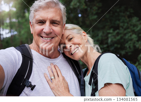 Selfie portrait, hiking and mature couple hug in forest, fitness love and outdoor health with happy blog update. Nature, travel and trekking face of mature people in woods with profile picture post Selfie portrait, hiking and mature couple hug in forest, fitness love and outdoor health with happy blog update. Nature, travel and trekking face of mature people in woods with profile picture post 134081565