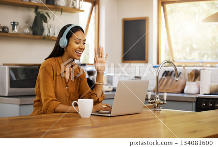 Remote work, video call and woman on laptop in home for virtual meeting, strategy and business planning. Freelance, communication and girl working with headphones for seminar, talking or conversation Remote work, video call and woman on laptop in home for virtual meeting, strategy and business planning. Freelance, communication and girl working with headphones for seminar, talking or conversation 134081600