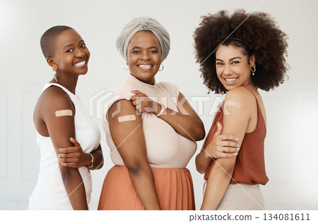 Happy, portrait and women excited about vaccine isolated on a white background in a studio. Covid, plaster and corporate employees or friends together after getting vaccinated for office compliance Happy, portrait and women excited about vaccine isolated on a white background in a studio. Covid, plaster and corporate employees or friends together after getting vaccinated for office compliance 134081611