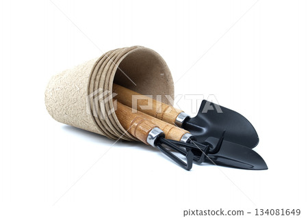 Gardening tools and pots arranged on a white background for planting Gardening tools and pots arranged on a white background for planting 134081649