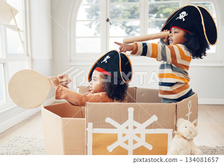 Pirate, box and playing with children in living room for bonding, imagine and creative. Happy, youth and siblings with girls sailing in cardboard ship in family home for relax, fantasy and games Pirate, box and playing with children in living room for bonding, imagine and creative. Happy, youth and siblings with girls sailing in cardboard ship in family home for relax, fantasy and games 134081657