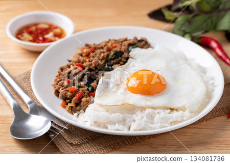 Thai food, Stir fried holy basil with minced pork with cooked rice and fried egg on top 134081786