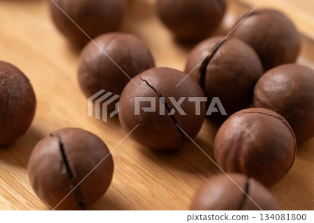 Macadamia nuts on wooden background, Close up Macadamia nuts on wooden background, Close up 134081800