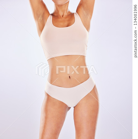 Woman, body and stomach for healthy lifestyle in studio as motivation for weight loss, diet or fitness. Healthy female model on a white background for health, wellness or underwear with mockup space Woman, body and stomach for healthy lifestyle in studio as motivation for weight loss, diet or fitness. Healthy female model on a white background for health, wellness or underwear with mockup space 134081996
