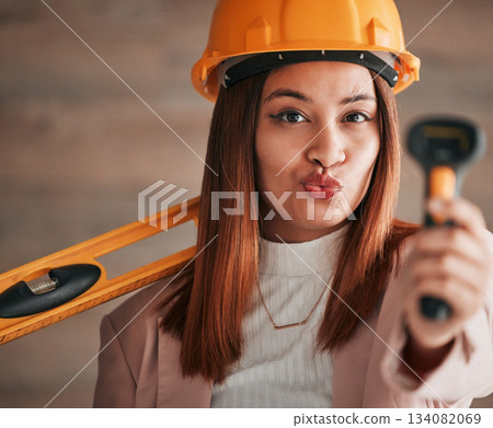 Engineer pout, business woman and portrait of a property management worker with construction tools. Safety helmet and stud detector for a home renovation project with happy and silly female employee 134082069