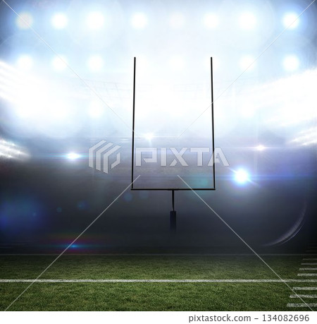 lone football goalpost is standing on turf near yard line under glowing floodlights, flat design 134082696