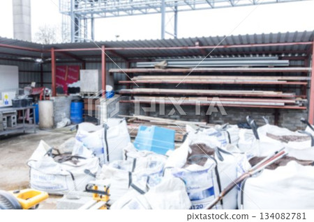 White bulk bags are being shown in flat design storage area, with pipes and pallet jack White bulk bags are being shown in flat design storage area, with pipes and pallet jack 134082781