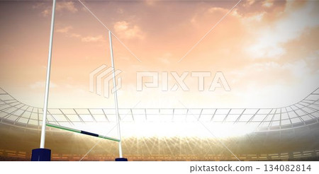 Rugby goalposts are being shown on grass pitch in flat design stadium, with floodlights and stands Rugby goalposts are being shown on grass pitch in flat design stadium, with floodlights and stands 134082814
