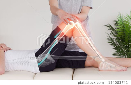 Highlighted bones of injured woman having leg massage Highlighted bones of injured woman having leg massage 134083741