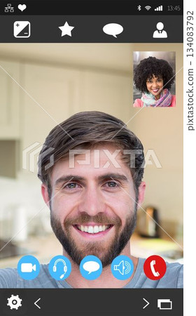 Smiling bearded man appearing in flat design call with curly-haired woman inset, controls, kitchen 134083792