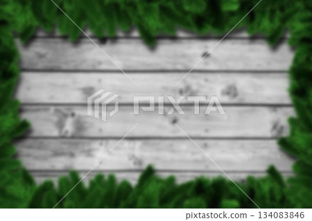 Blurred fir branches on wood 134083846