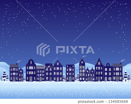 A winter night scene featuring a charming row of old-style houses softly illuminated against a deep blue sky, while delicate snowflakes sparkle in the night air.	 134085689