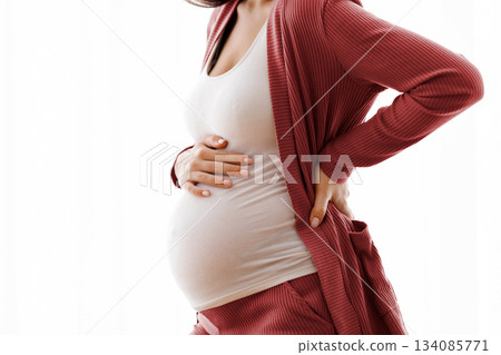 Pregnancy Pain. Cropped Shot Of Young Pregnant Lady Feeling Unwell At Home, Millennial Female Standing Against Window, Touching Belly And Lower Back, Suffering Prenatal Contractions, Free Space Pregnancy Pain. Cropped Shot Of Young Pregnant Lady Feeling Unwell At Home, Millennial Female Standing Against Window, Touching Belly And Lower Back, Suffering Prenatal Contractions, Free Space 134085771