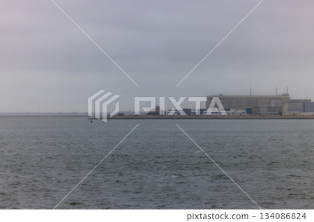 Den Helder, The Netherlands, Oktober 28th, 2024, An industrial facility strategically positioned to Den Helder, The Netherlands, Oktober 28th, 2024, An industrial facility strategically positioned to 134086824