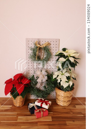 Poinsettia and wreath 134089024