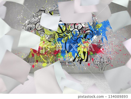 Papers over grey wall with illustrations and splashes 134089893