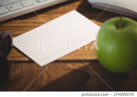 Keyboard and mouse by apple on table Keyboard and mouse by apple on table 134090076