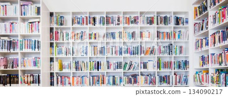 Teacher reading books to her students 134090217