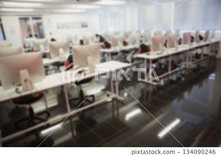 Computers in illuminated office 134090246