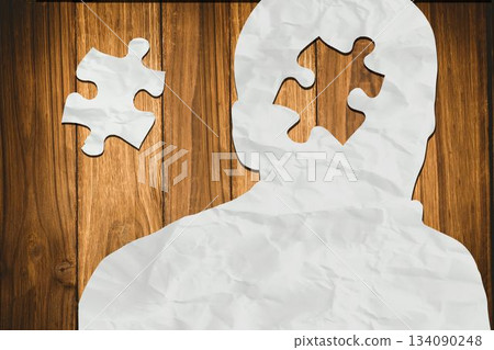 Composite image of paper in form of people on wooden background Composite image of paper in form of people on wooden background 134090248